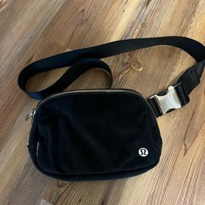 Lululemon black and gold belt bag